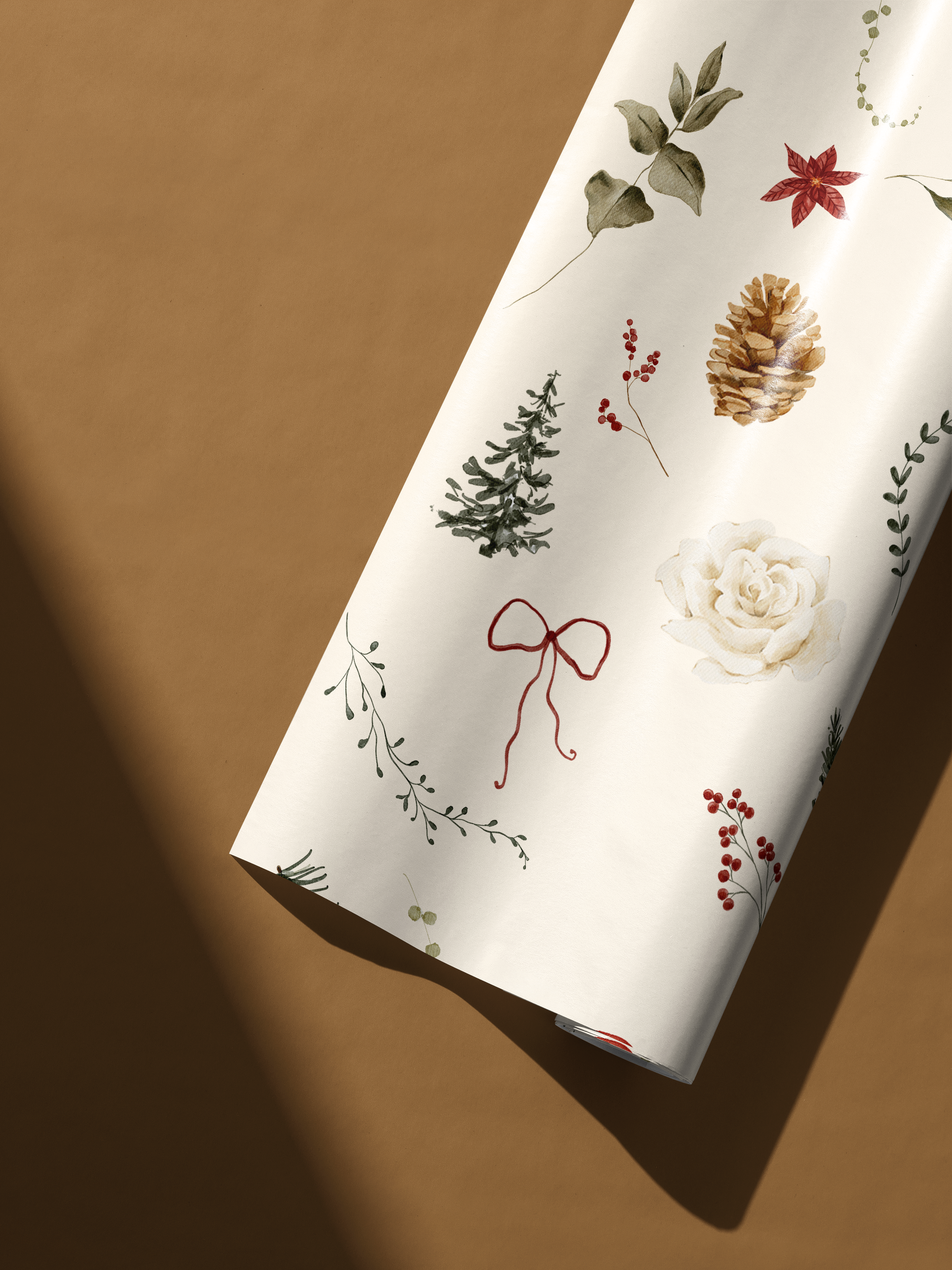Alt Tag: Winter Garden botanical Christmas wrapping paper with watercolor pinecone, holly, evergreen sprigs, ornaments and bow on cream backdrop