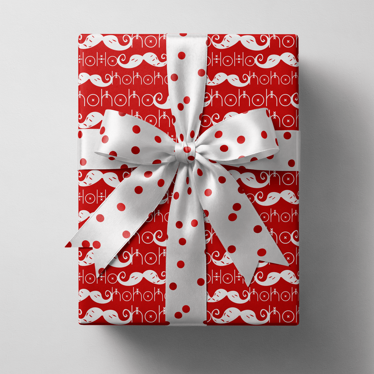 Funny Christmas wrapping paper where white HO HO HO lettering forms Santa&