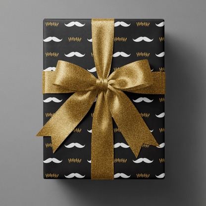Black and gold wrapping paper christmas with white mustaches and gold Ho Ho Ho script.