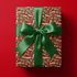 Gingerbread christmas wrapping paper with smiling gingerbread men in Santa hats on forest green.