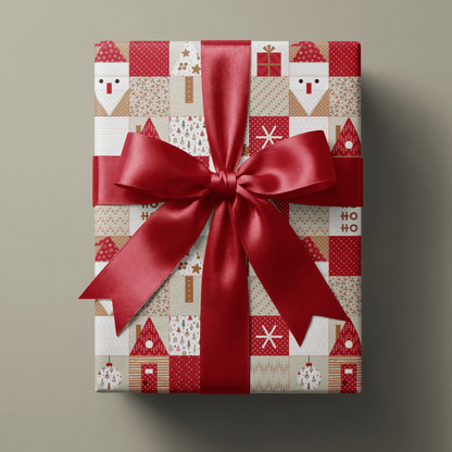 Rustic christmas wrapping paper with patchwork Santas, gingerbread houses, and star quilt blocks in red and cream.
