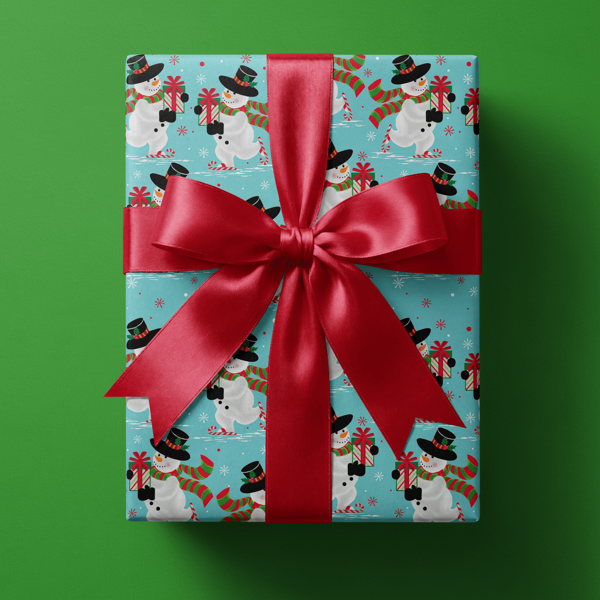 Christmas snowman wrapping paper with a top-hatted snowman ice skating on turquoise.