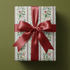 Floral christmas wrapping paper with wildflower bouquets in red and sage on white.