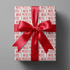 Naughty christmas wrapping paper with repeating bold red "I was mostly nice" text on white.