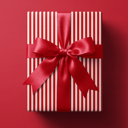 Candy cane stripe wrapping paper with even red and white vertical stripes.
