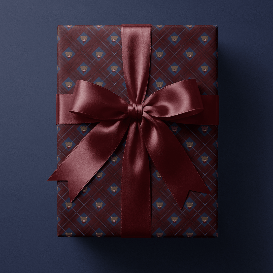 Teddy bear christmas wrapping paper with burgundy tartan and navy argyle diamonds.