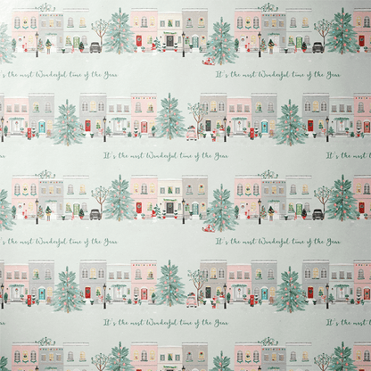 Close-up of the ribbon bow on a gift wrapped in mint christmas wrapping paper