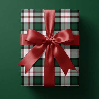 Gift wrapped in Deerfield green plaid wrapping paper, Winter Lodge colorway, tied with a white ribbon bow