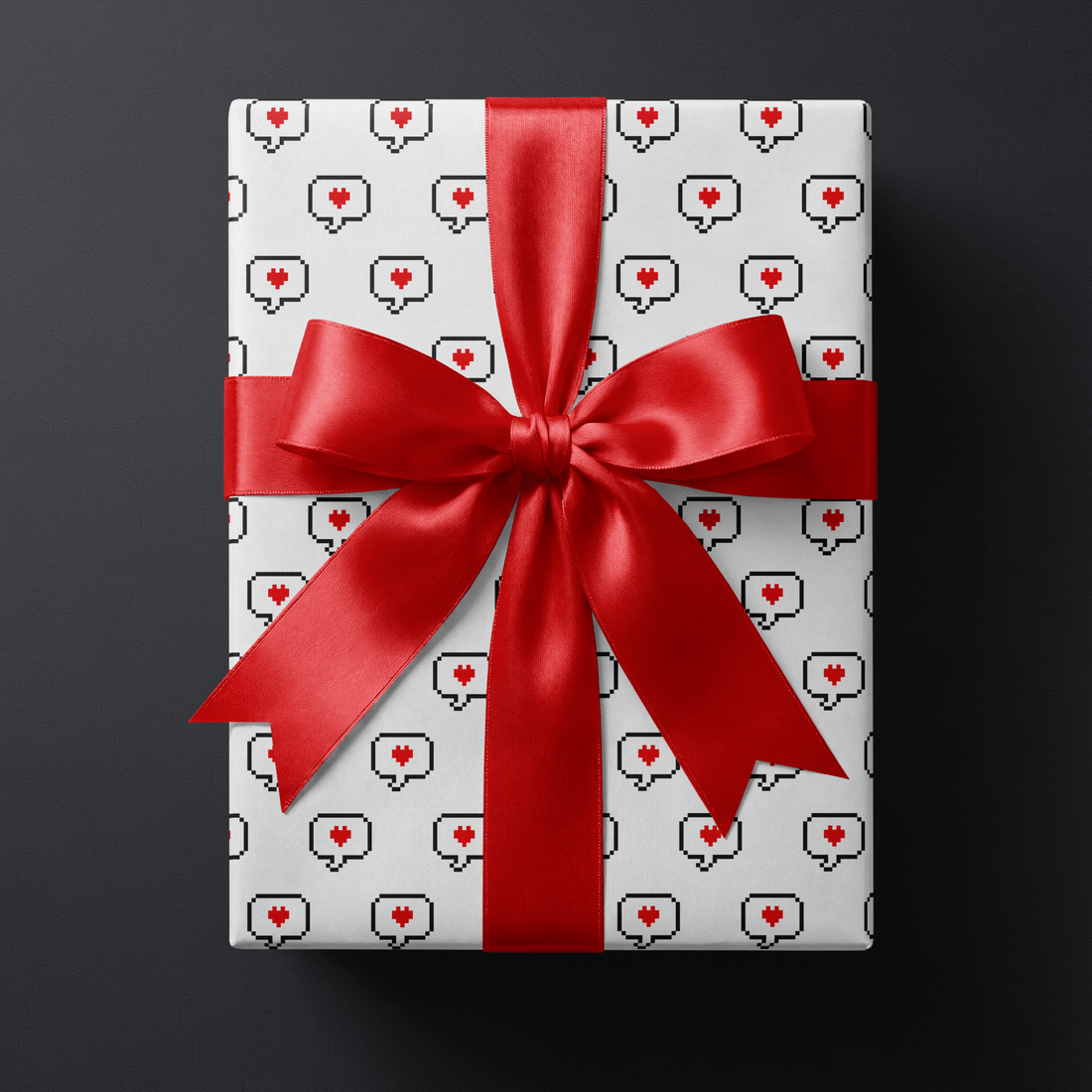 Haus of Wrap red heart gift wrap with luxe bow, perfect for birthday, wedding, or holiday gifts. Boutique style elegance.