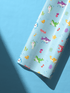Alt Tag: Giggles Under the Sea baby shark wrapping paper with colorful sharks & notes, childrens wrapping paper for birthday or baby shower