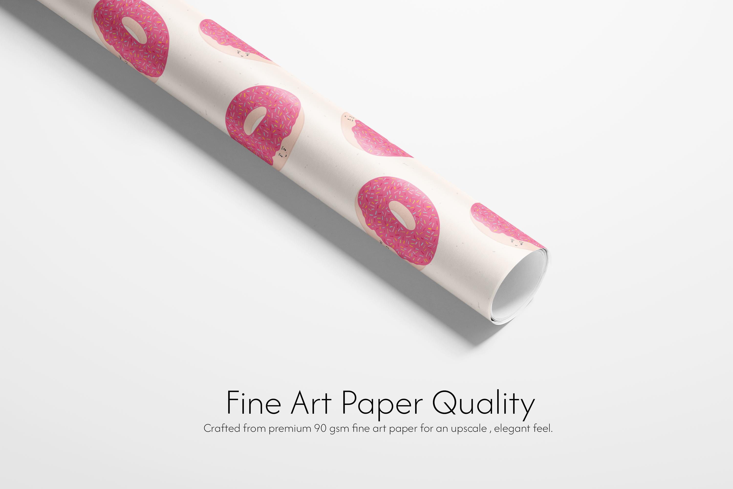 Alt Tag: Donut Wrapping Paper roll with pink frosted sprinkle donuts on neutral background, fine art paper quality gift wrap